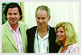 Three time Gentlemen's Singles Champion John McEnroe (1981, 1983 & 1984), meets guests at Wimbledon