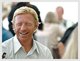 Boris Becker chats to guests at Wimbledon. He has won the Gentlemen's Singles Championship three times (1985, 1986 & 1989).